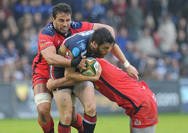 TOUGH NIGHT: Doncaster Knights' Declan Cusack finds his path blocked by the Bristol line. Pictures: Scott Merrylees