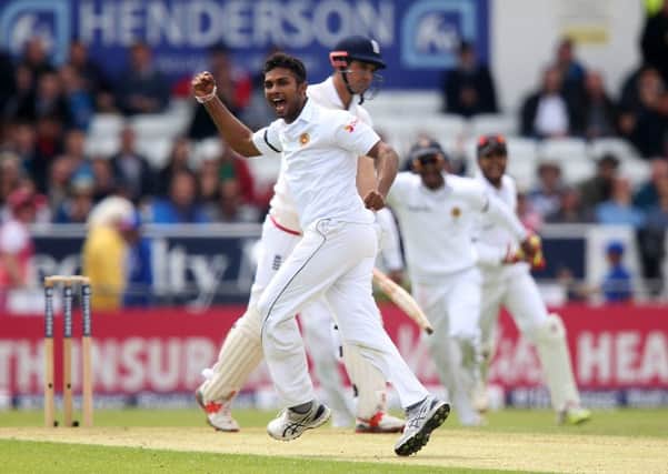 Sri Lanka's Dasun Shanaka  celebrates taking the wicket of England's Alastair Cook during day one of the 1st Investec Test at Headingley, Leeds.