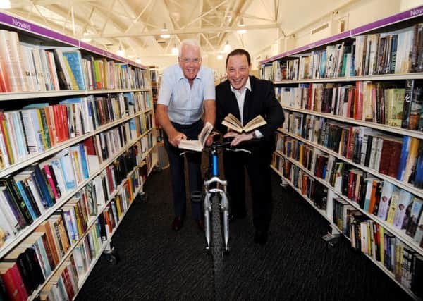 Couns Neil Buckley (left) and Dan Cohen at the Moor Allerton Bike Library. Picture by Simon Hulme.