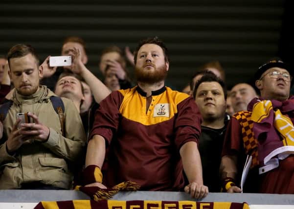 Bradford City fans look understandably crestfallen after the final whistle at Millwall (Picture: Steven Paston/PA Wire).