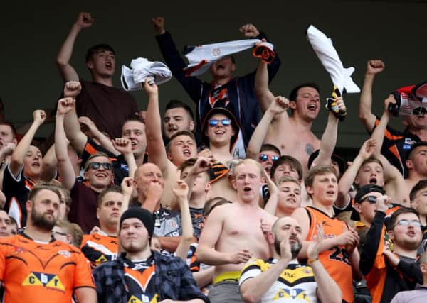 Castleford Tigers fans celebrate during the 2016 Magic Weekend match at St James' Park. Picture: Richard Sellers/PA.