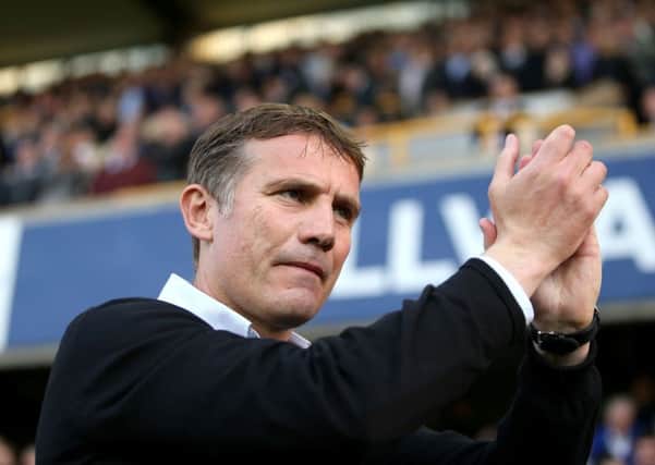 Bradford City manager Phil Parkinson applauds the travelling fans at Millwall (Picture: Steven Paston/PA Wire).