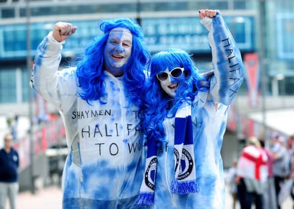 WINNERS: Halifax fans John Gaukroger and Suzanne Hudson
on Wembley Way .
 Picture: Jonathan Gawthorpe.