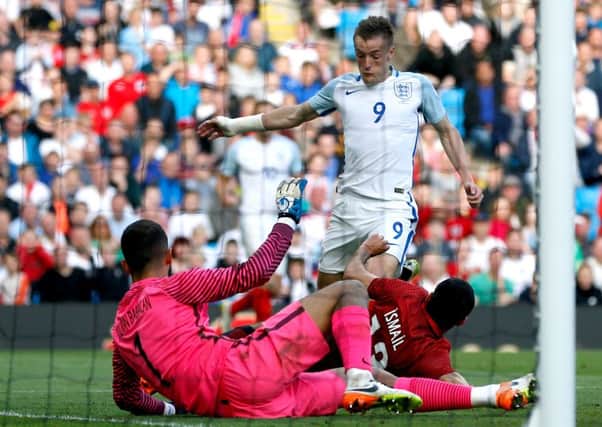 Englands Jamie Vardy scores his sides second goal past grounded Turkey goalkeeper Volkan Babacan to give the hosts at the Etihad Stadium a fortunate 2-1 victory. (Picture: Owen Humphreys/PA).