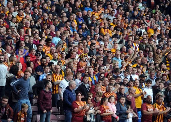 CHANGING TIMES: Bradford City fans at Valley Parade at the recent play-off semi-final against Millwall.  Picture:Tony Johnson