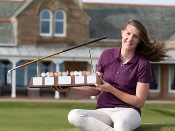 Olivia Winning with the Scottish ladies stroke play trophy (Picture: Kenny Smith).