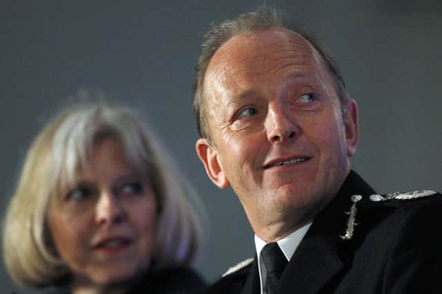 Hugh Orde, former president of ACPO, pictured with Home Secretary Theresa May
