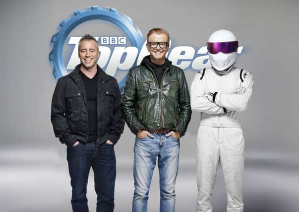 Matt LeBlanc, Chris Evans and The Stig take the wheel of the new-look Top Gear. PIC: PA Photo/BBC