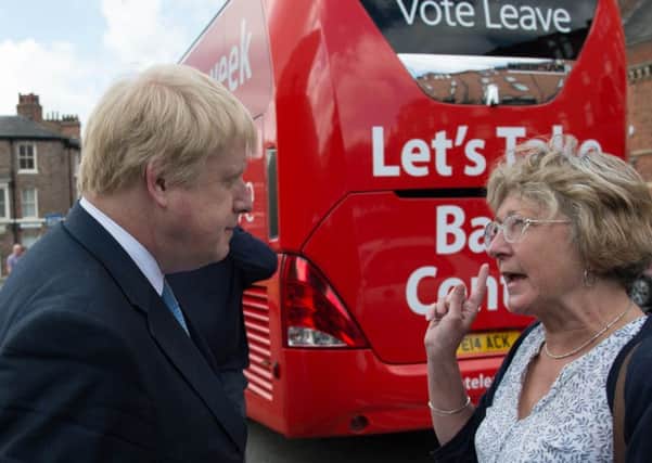 Vote Leave campaigner Boris Johnson meets a voter in York.