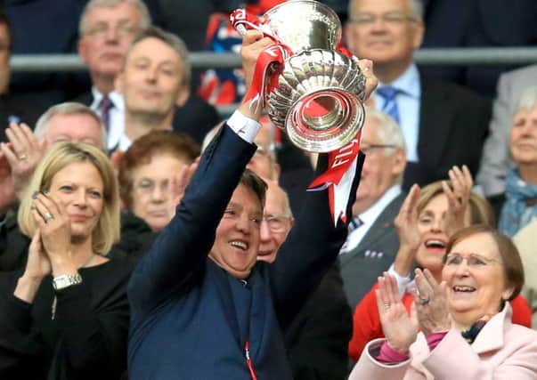 Winning the FA Cup on Saturday failed to save Louis van Gaal from getting the sack at Manchester United (Picture: Mike Egerton/PA).