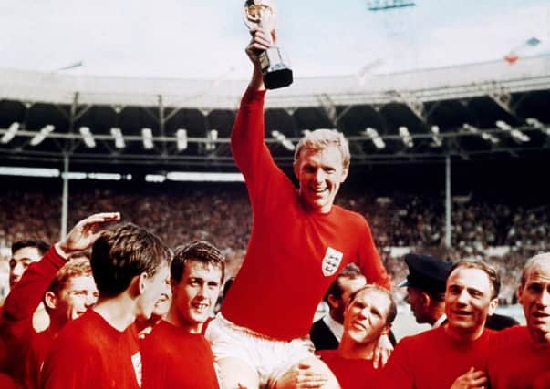 Bobby Moore lifts the World Cup in 1966.