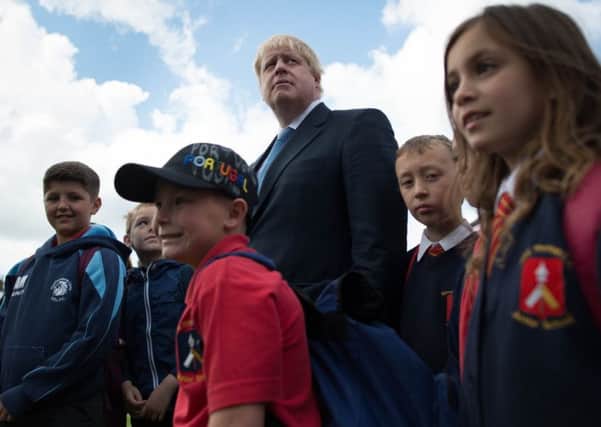 Former Mayor of London Boris Johnson meets school children in York, where he was travelling on the Vote Leave campaign bus ahead of the EU referendum in June. Picture: Stefan Rousseau/PA Wire