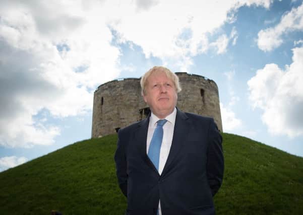 Former Mayor of London Boris Johnson stands in front of Clifford's tower in York, where he was travelling on the Vote Leave campaign bus ahead of the EU referendum in June. Picture: Stefan Rousseau/PA Wire