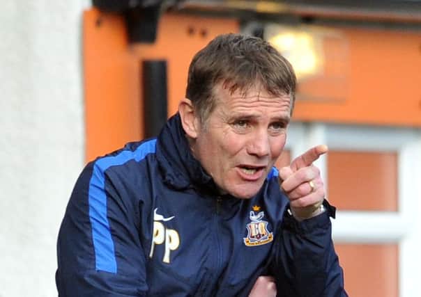 Manager Phil Parkinson held talks yesterday with Bradford Citys new owners Edin Rahic and Stefan Rupp (Picture: Tony Johnson).
