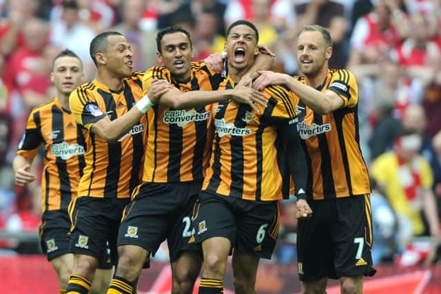 Hull City's Curtis Davies, (6) celebrates after scoring the second goal of the match with his team-mates