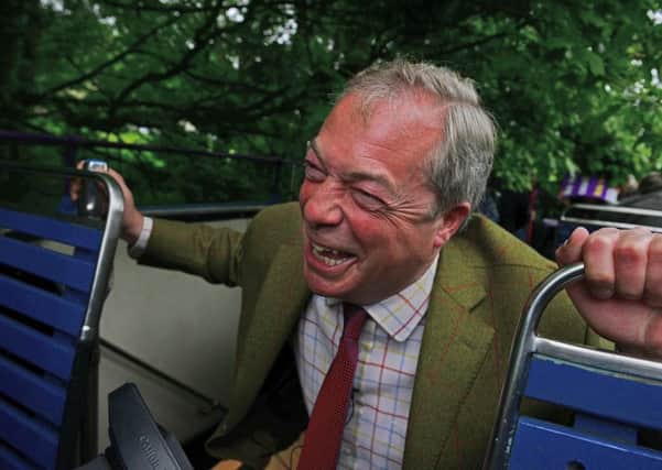 Nigel Farage ducks to avoid low-hanging branches as his open-top bus makes its way through Sheffield. Picture: Scott Merrylees