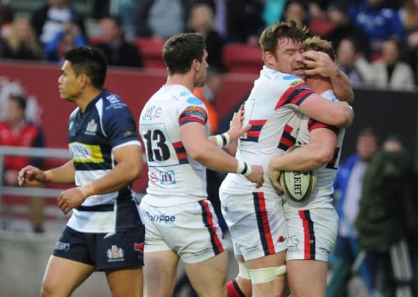 Doncaster Knights players celebrate Will Hurrell's try.