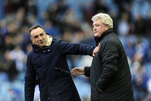 RIVALS: Sheffield Wednesday manager Carlos Carvalhal and Hull City boss Steve Bruce. Picture: Steve Ellis.