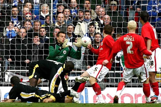 Barnsley goalkeeper Luke Steele saves a header from Cardiff City's Gavin Rae during the FA Cup Semi-Final in 2008. Picture: PA.