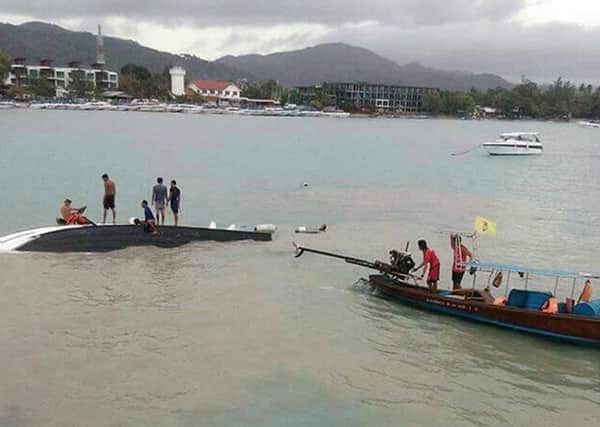 Handout photo taken with permission from the twitter feed of Nalinee Siriked of the scene near Koh Samui in Thailand after a British woman died after a speedboat reportedly hit a rock and capsized. PRESS ASSOCIATION Photo. Issue date: Thursday May 26, 2016. Another British national was injured in the accident on Thursday afternoon, the Foreign Office said. There were 32 passengers and four crew on the boat which was travelling from Mu Ko Ang Thong National Park when it capsized, the Bangkok Post reported. See PA story ACCIDENT Thailand. Photo credit should read: HS8TLA/PA Wire

NOTE TO EDITORS: This handout photo may only be used in for editorial reporting purposes for the contemporaneous illustration of events, things or the people in the image or facts mentioned in the caption. Reuse of the picture may require further permission from the copyright holder.