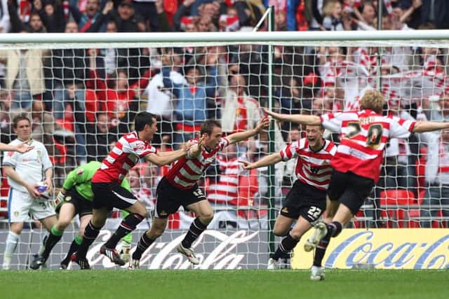Doncaster Rovers' James Hayter (centre) celebrates scoring his side's winning goal against Leeds back in 2008. Picture: Nick Potts/PA.