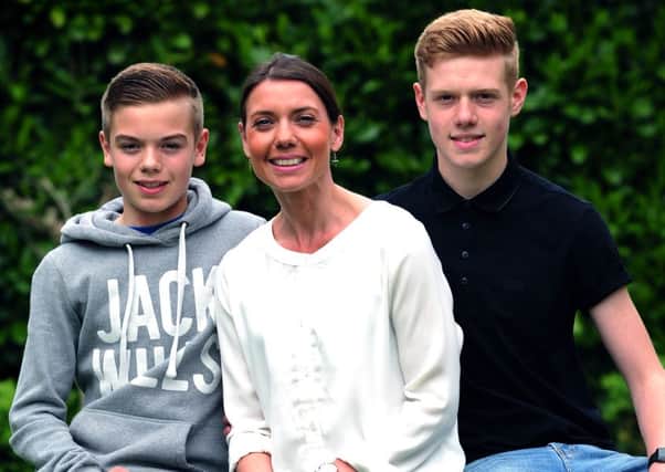 Kate Dawson with her sons Sam and Josh