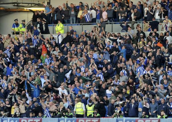 Sheffield Wednesday fans, seen celebrating their play-off semi-final victory against Brighton, have sold out their allocation for Saturday's final at wembley, below. Picture: Steve Ellis