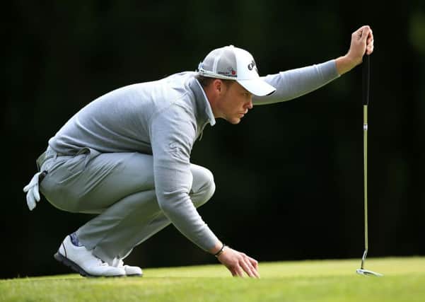 Sheffield's Danny Willett sizes up a putt the BMW PGA Championship at Wentworth. Picture: John Walton/PA.