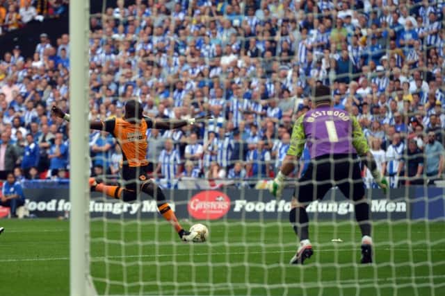 Mo Diame hits the woodwork.  Picture Tony Johnson