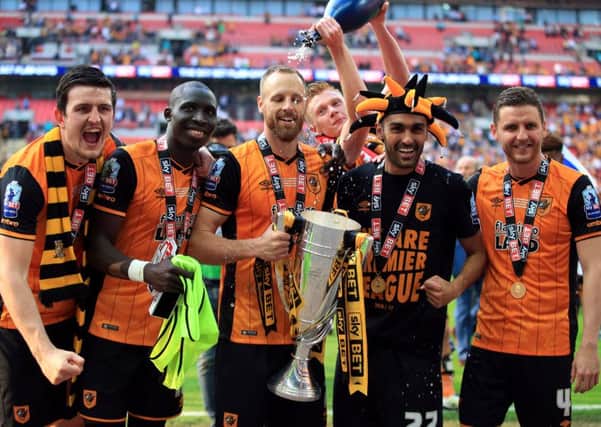 (L-R) Hull City's Harry Maguire, Mohamed Diame, David Meyler, Sam Clucas, Ahmed Elmohamady and Alex Bruce celebrate after the Championship Play-Off Final at Wembley Stadium, London.