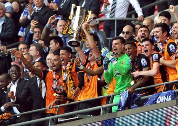 Hull City celebrate getting back in the Premiership after a 1-0 win.  Picture Tony Johnson