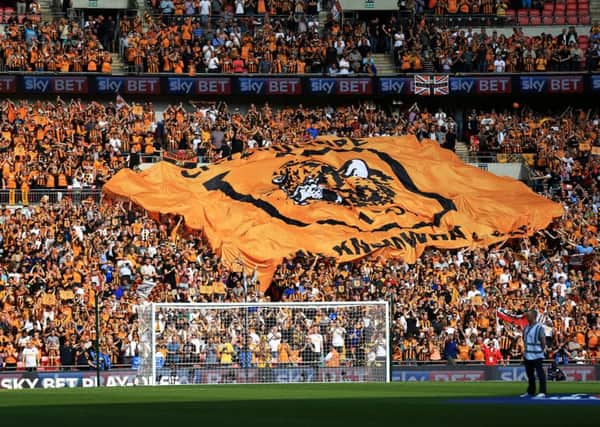 Hull City fans in the stands the Championship Play-Off Final at Wembley Stadium, London.