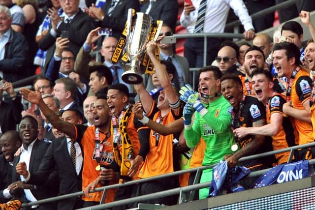 MAGIC MOMENT: 
Hull City celebrate getting back in the Premier League after a 1-0 win.  Picture Tony Johnson
