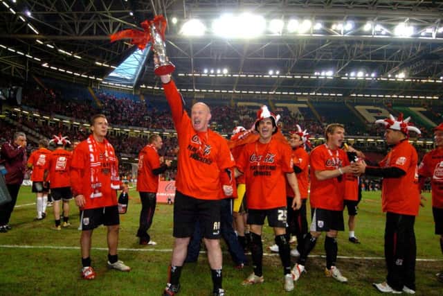 Barnsley's manager Andy Ritchie celebrates winning the Coca Cola league play-off final against Swansea in Cardiff in 2006.