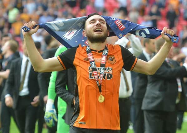 MISSION ACCOMPLISHED: Robert Snodgrass celebrate promotion back to the Premier League.  Picture: Tony Johnson