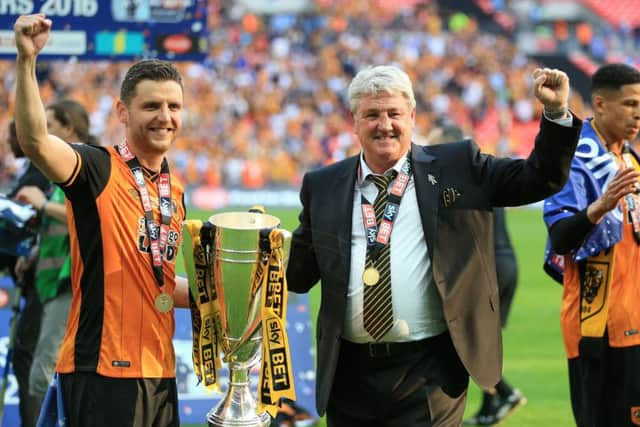 Hull City manager Steve Bruce (right) and his son Alex Bruce celebrate after the Championship Play-Off Final
