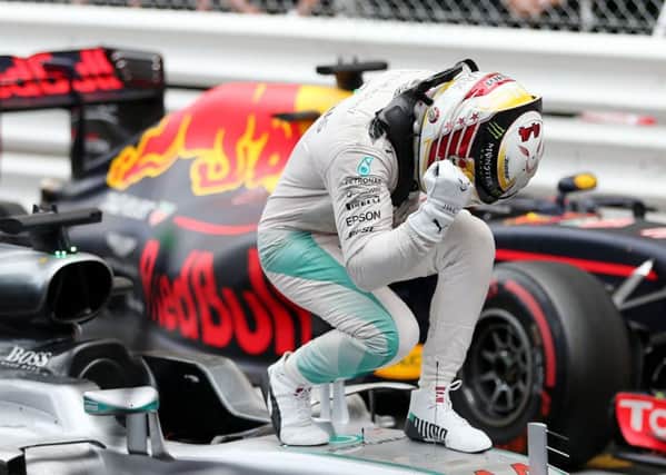 Mercedes' Lewis Hamilton celebrates his victory in the 2016 Monaco Grand Prix at the Circuit de Monaco, Monaco.