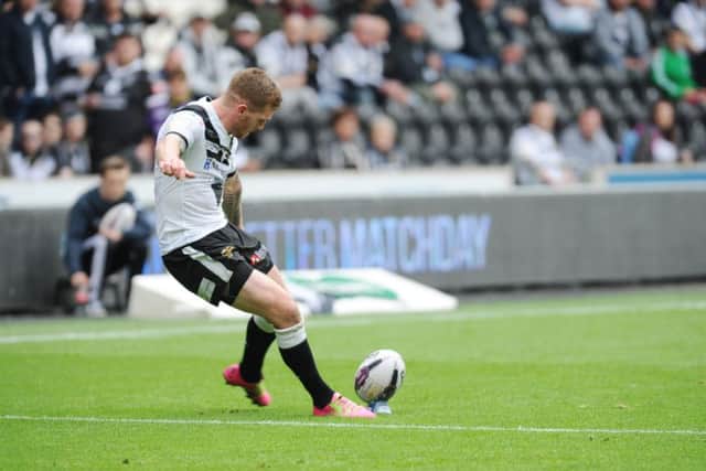 Hull FC's Marc Sneyd kicks a conversion. Picture: Steve Riding