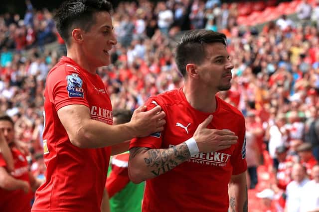 Barnsley's Adam Hammill (right) celebrates scoring his side's second goal Picture: Nick Potts/PA.