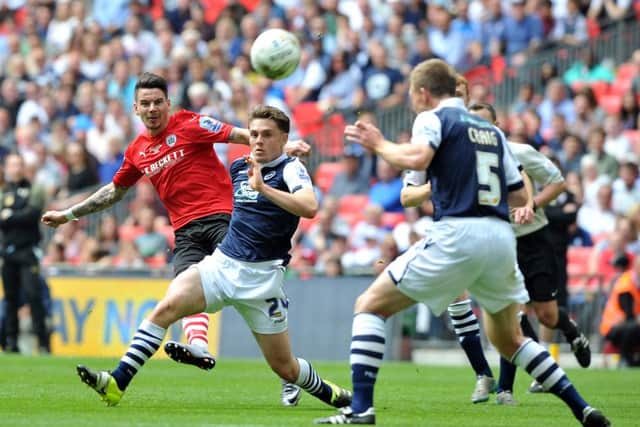 STUNNER: Barnsley's Adam Hammill curls in his side's second goal against Millwall at Wembley.  Picture: Tony Johnson