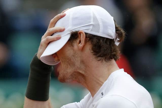 Andy Murray shows his frustration during his battl against John Isner. Picture: AP/Michel Euler.