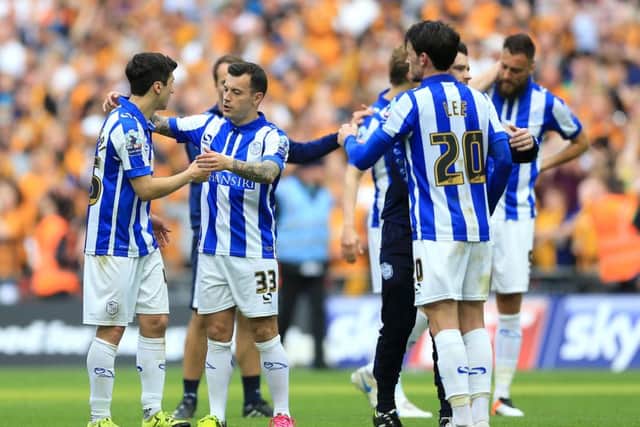 Sheffield Wednesday's Fernando Forestieri, Ross Wallace and Kieran Lee look dejected after the Championship Play-Off Final at Wembley Stadium, London.