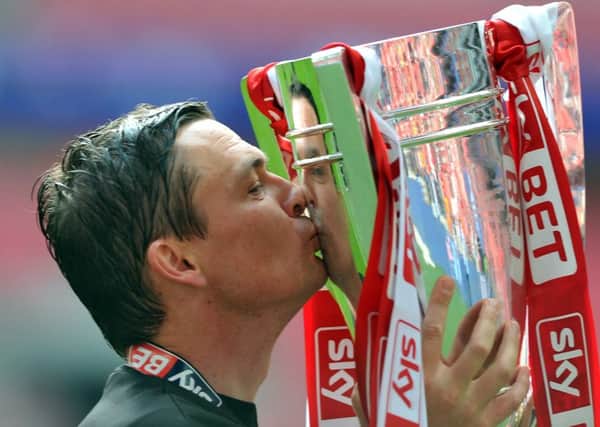 Paul Heckingbottom got his hands on a second piece of silverware in less than two months yesterday at Wembley, just four months after taking charge of his hometown club Barnsley on an interim basis. (Picture: Tony Johnson)