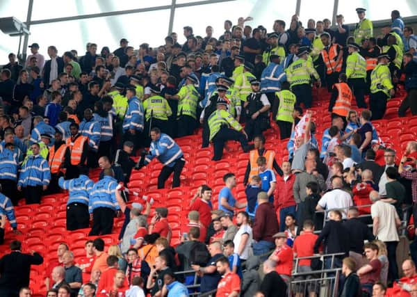 Security in the stands during the Sky Bet League One Play-Off Final at Wembley Stadium.