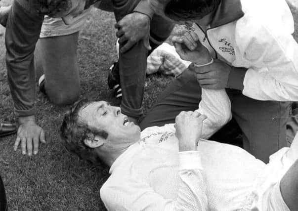Mick Jones is treated on the pitch during the 1972 Cup Final.