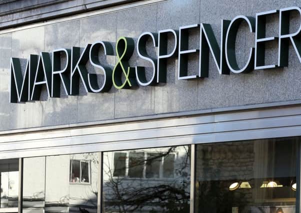 Marks & Spencer is under scrutiny because of poor sales of clothes.