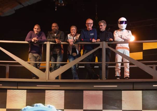 Top Gear presenters (left to right) Chris Harris, Rory Reid, Sabine Schmitz, Chris Evans, Eddie Jordan and The Stig.