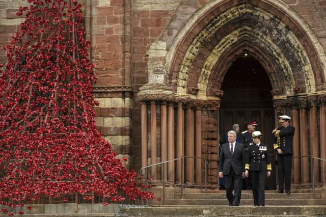 German President Joachim Gauck and the Princess Royal  leave St Magnus Cathedral in Kirkwall, Orkney, after a service to mark the centenary of the Battle of Jutland.