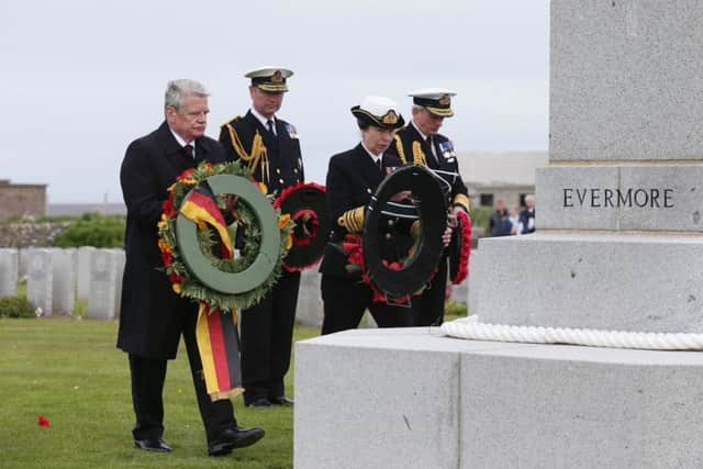(Left to right) German President Joachim Gauck, Vice Admiral Sir Timothy Laurence, the Princess Royal and Admiral Sir Philip Jones lay wreaths during a service at Lyness Cemetery on the island of Hoy, Orkney, to mark the centenary of the Battle of Jutland.
