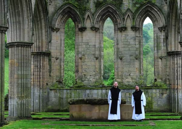 Friar Joseph and Brother Bernard from the Cistercian order of monastery of Mount Saint Bernard Abbey in Leicestershire visit Rievaulx Abbey.
